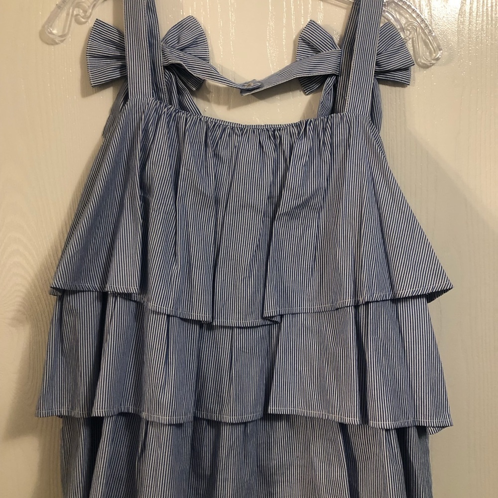Casual blue and white striped top.